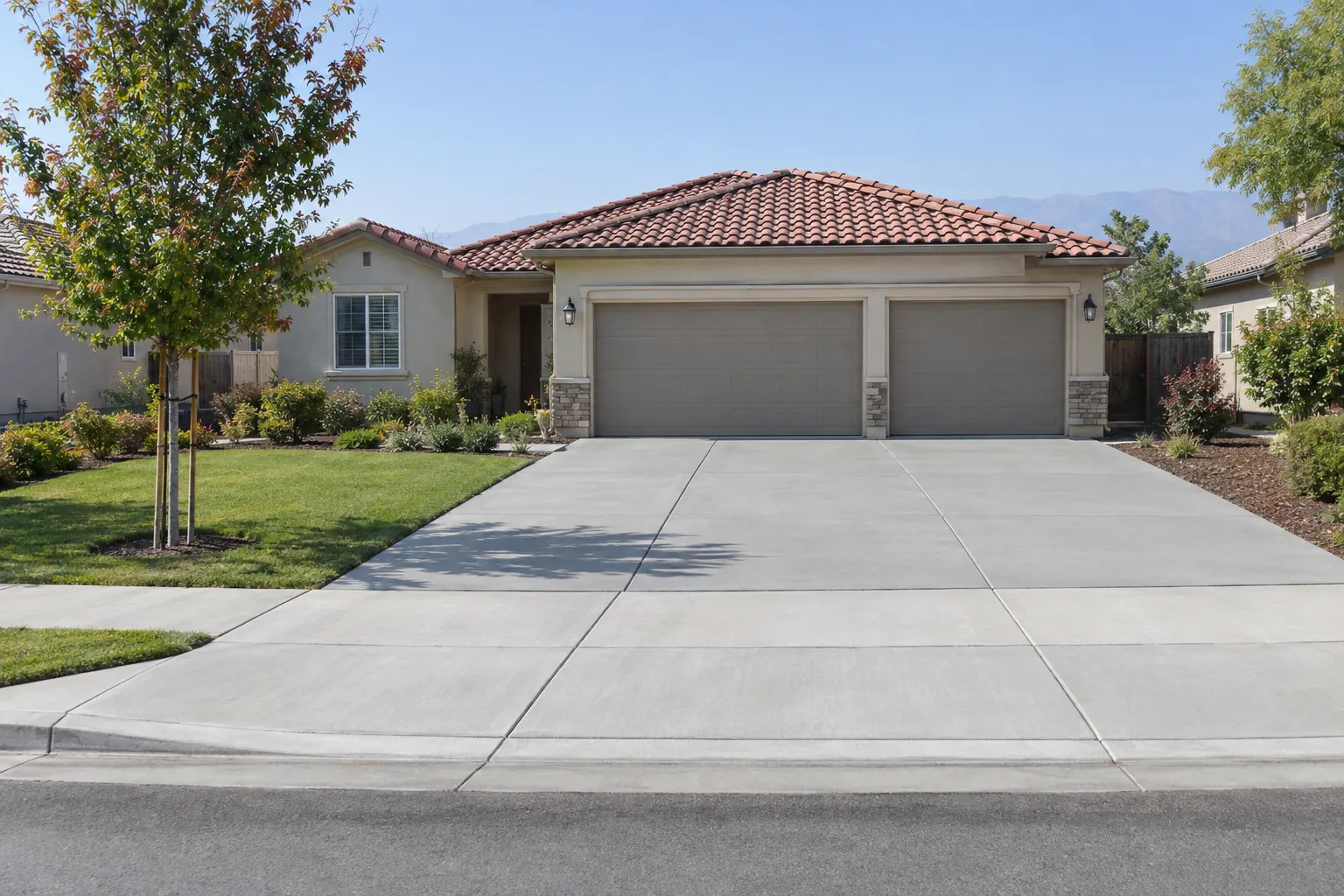 New concrete driveway at a home in Clovis, CA