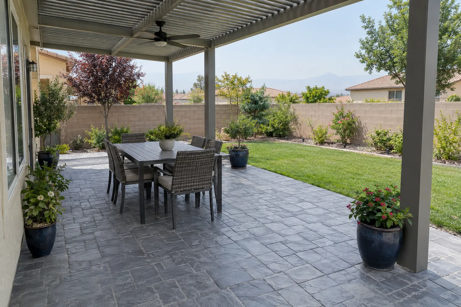 Stamped concrete patio under a shade cover in Clovis, CA
